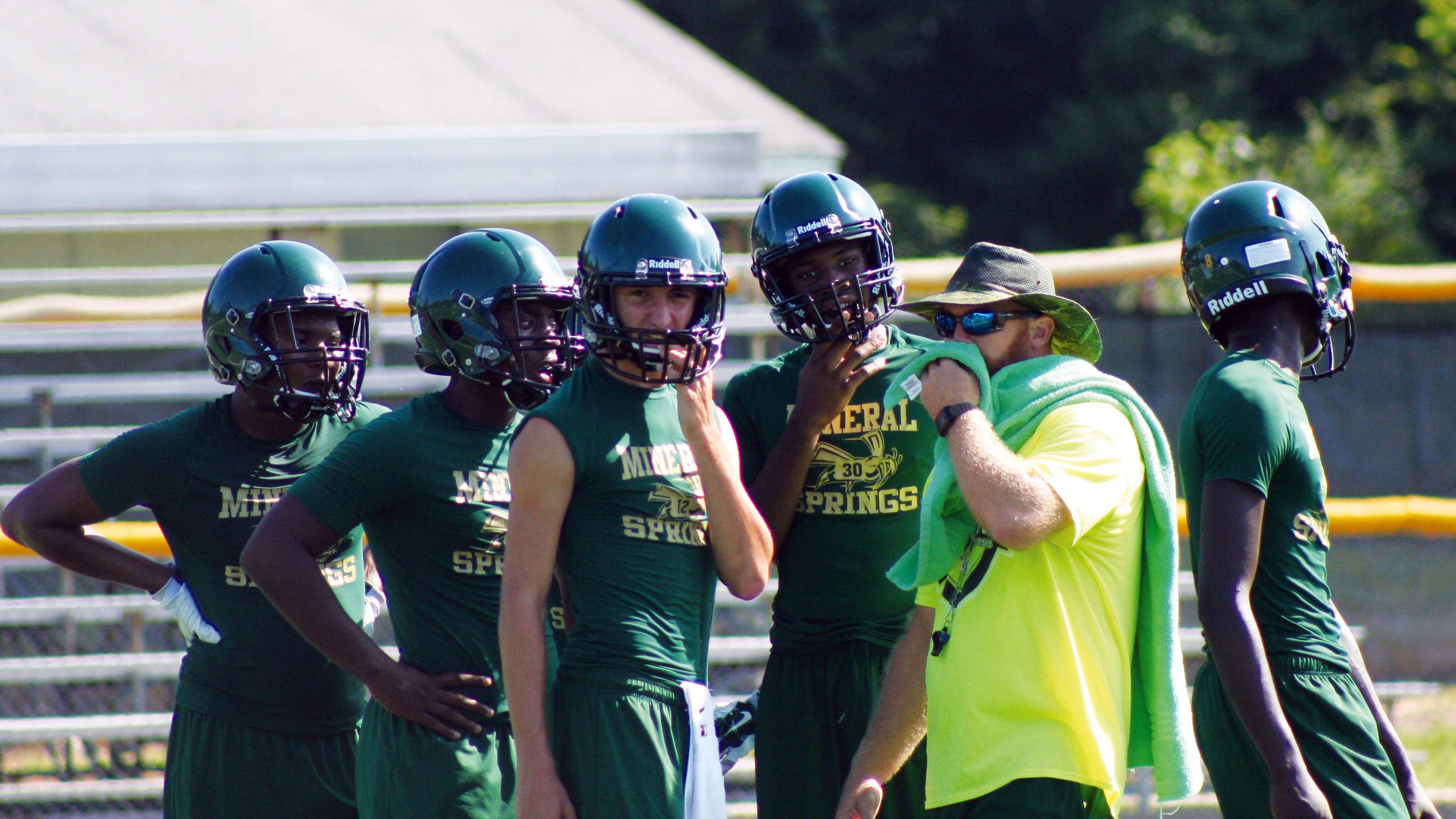 Mineral Springs Hornet Head Coach Jason Burns at work with his offense during Tuesday's 7-on-7.