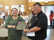 Daughter accepts late father’s military service medals