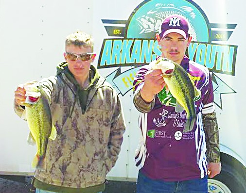 Luke Fiorello, left, and Johnathan Legrange, right, finished in third place in the junior high division at the “Seige on Bull Shoals.” The pair has qualified for the state tournament to be held April 16 on Lake Ouachita. Photo by Rochelle Bissell