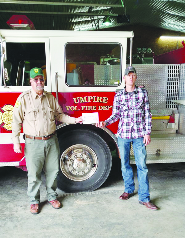 From left to right, John Crump, AFC County Ranger and Cohen Davis, Umpire VFD Fire Chief. 
