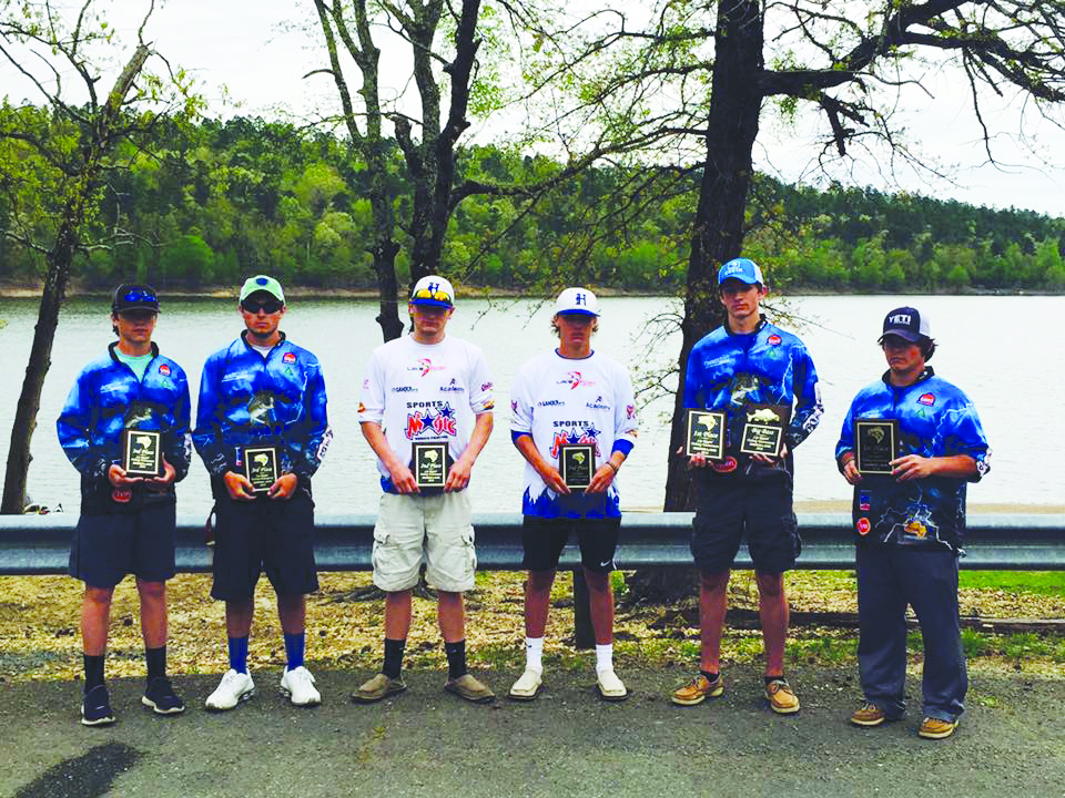 (left to right) Grant Strasner and Brady Strasner of Dierks High School, Ryan Tanner and Balon Powel of Hooks High School, and Blake Bradshaw and Brayden Kirby, of Dierks High School display their awards won at the Lip Rippin Fishing Tournament.