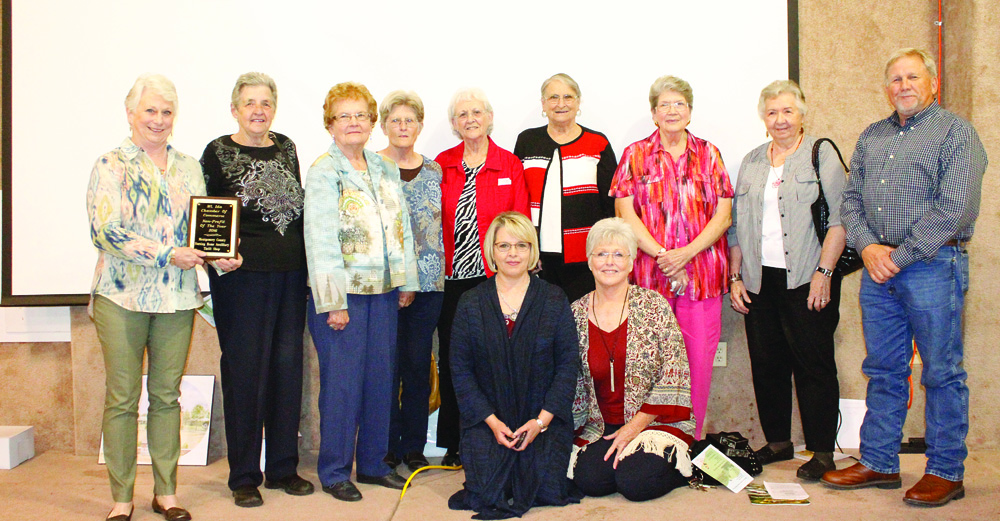 The Montgomery County Nursing Home Ladies Auxiliary Thrift Store was chosen to be the 2016 Mount Ida Area Chamber of Commerce Non-Profit Organization of the Year. Pictured left to right: Anita Watson, Mae Minton, Pat Hopper, Maurene Tanner, Jeneva Robbins, Jackie Cox, Judy Carlton, Helen Daniels, Tommie Johnston; (kneeling) Sherrie Morris andLinda West. 