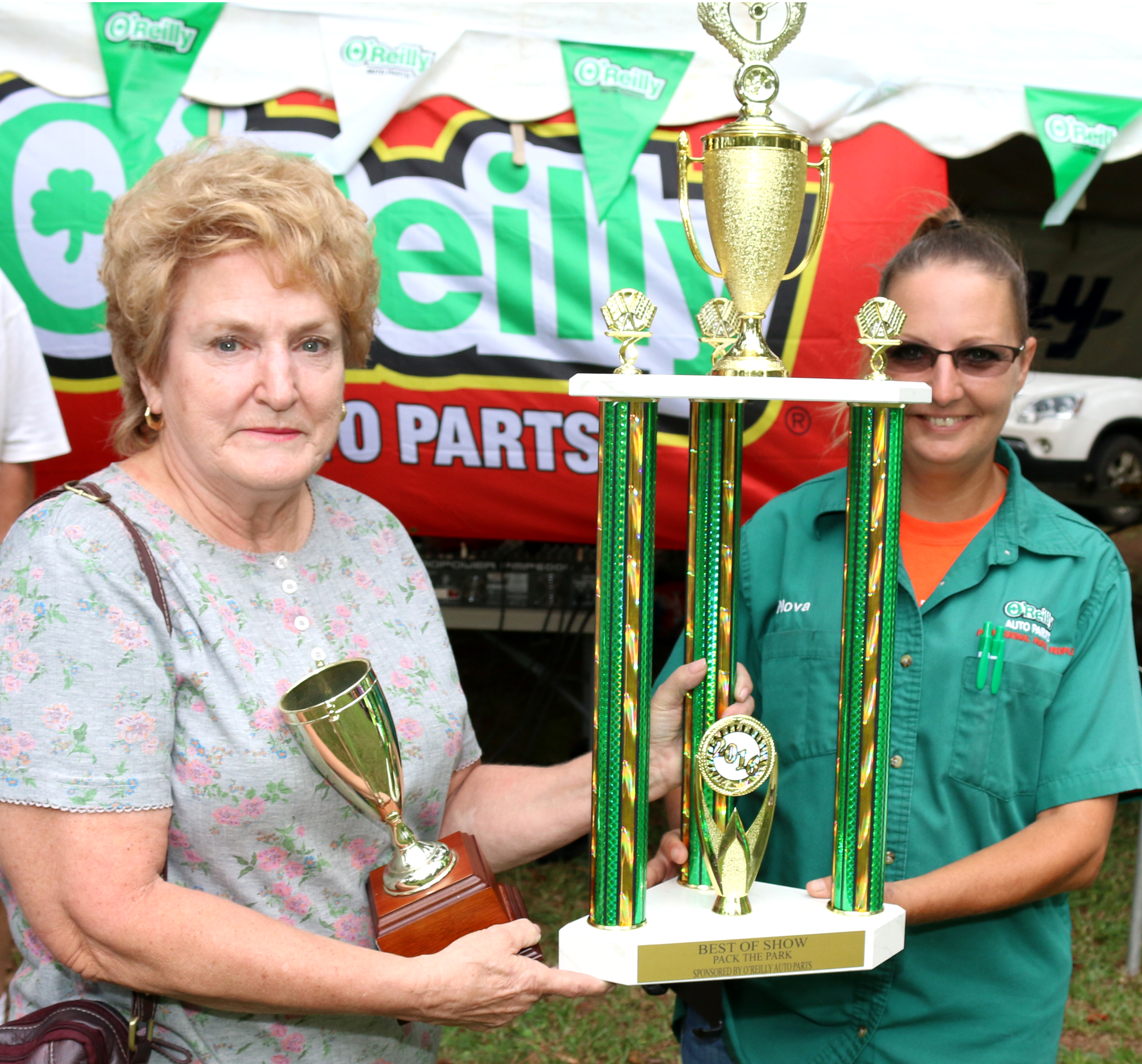 Joyce Banes of Nashville own Best of Show - Truck at the Pack the Park Car Show. She showed a 1954 Chevy Pickup. Exhibitors came from three states to show off their gleaming vehicles. The trophy was presented by Nova Hill.