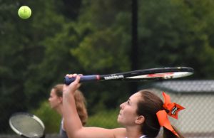 NHS netters split road matches