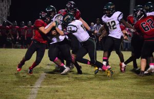 Rattlers roll Hornets, 60-36