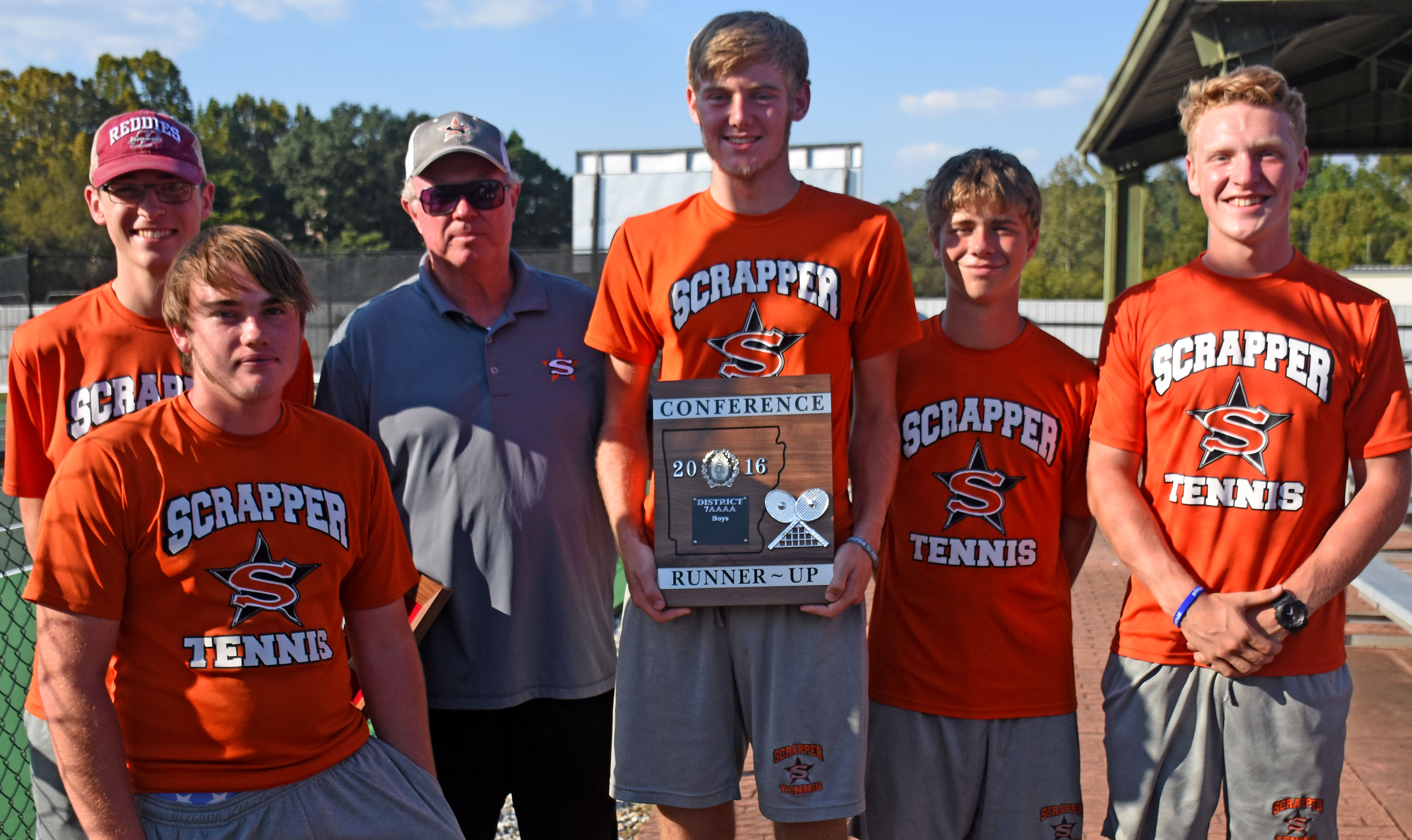 The Scrapper tennis team finished in the runner-up position at the District 7-4A tournament Monday. The team includes Eli Howard, Zach Backus, Coach Damon Williams, Glenn Hartness, Caleb Newton and Zach Williams. Hartness and Backus won the district doubles championship.