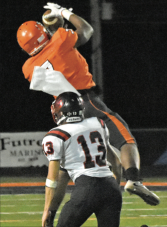 CJ Spencer goes up for the catch Friday night against Pea Ridge.