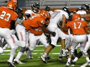 Scrappers open playoffs with 49-7 win over Dover