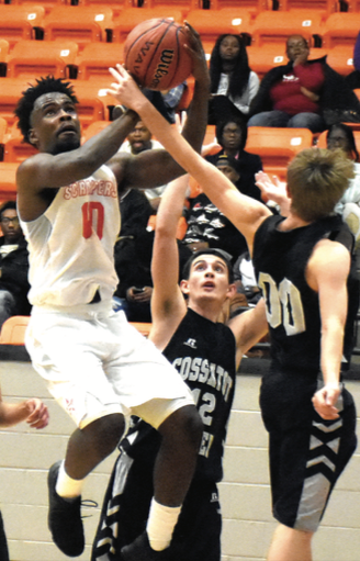 Darius Hopkins (00) goes up for a shot and draws the foul Dec. 20 in Nashville's win over Cossatot River.