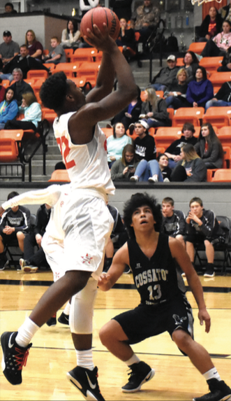 CJ Spencer (22) put up a scoring shot for Nashville against Cossatot River. The Scrappers are competing in the Dual State Tournament this week at Junction City. 