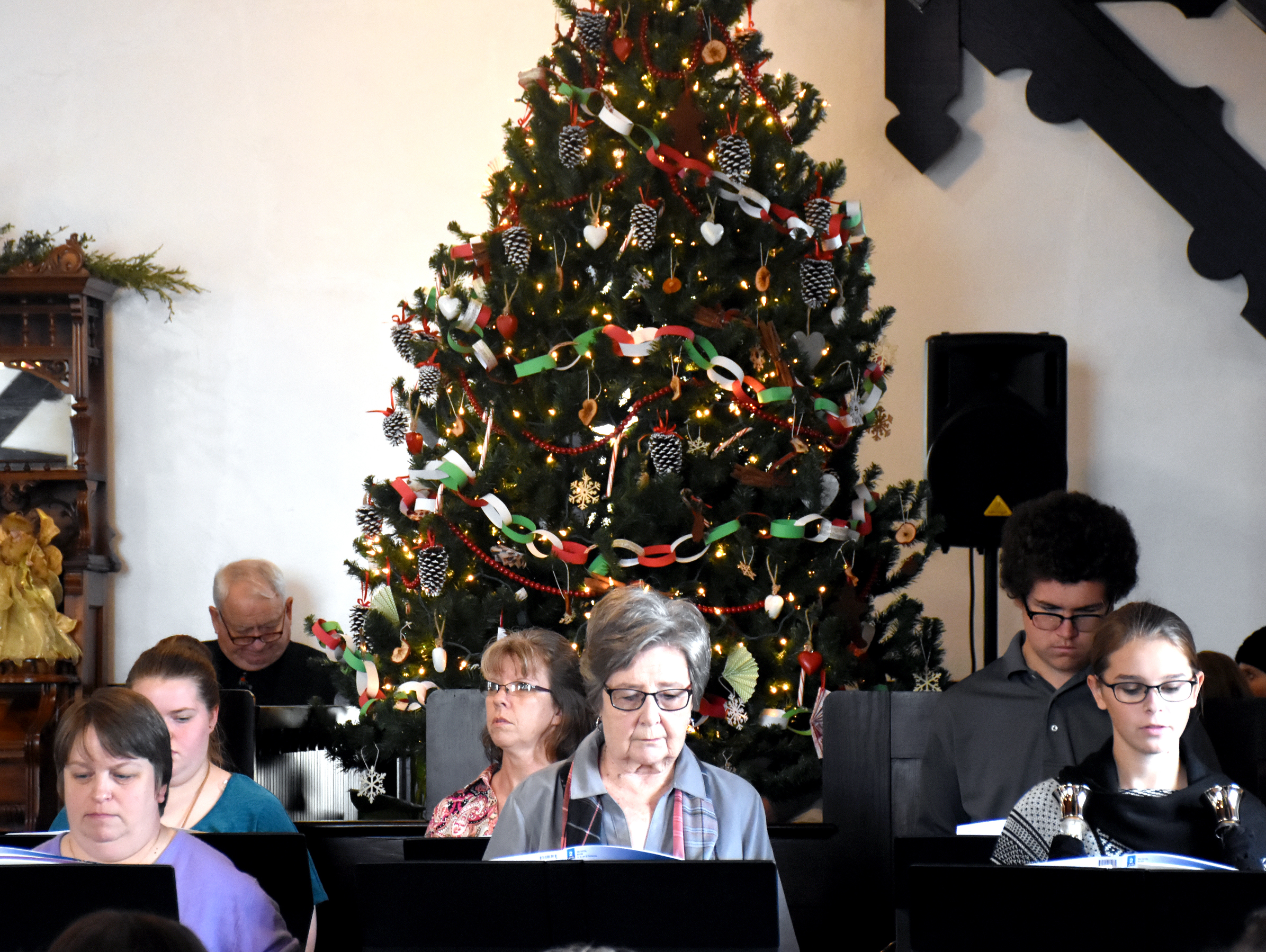 Members of the Agape Handbell Choir from First United Methodist Church present "We Three Kings" Sunday afternoon at the Hometown Christmas program at the Howard County museum in Nashville.