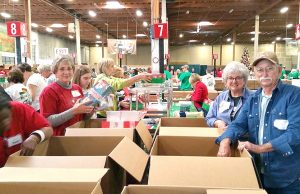 Christmas Child volunteers work at processing center