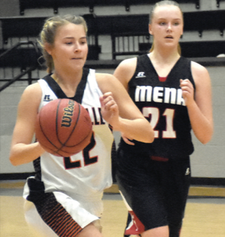 Kaylea Carver (22) controls the ball against Mena.