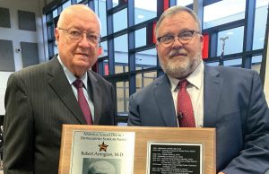 Two ‘distinguished scholars’ honored by NHS