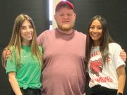 Four NHS students sign college letters