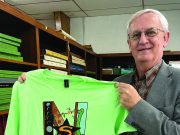 Nashville chamber selling eclipse T-shirts designed by NHS student