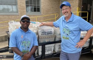 Letters carriers collect bounty for food drive