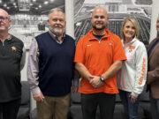 Three-time state champ back home as head Scrapper