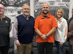 Three-time state champ back home as head Scrapper