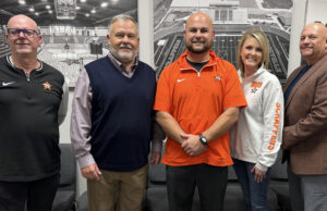 Three-time state champ back home as head Scrapper